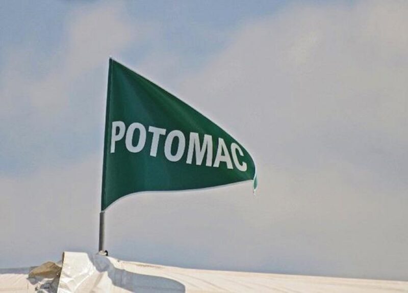 Green Potomac flag flying over the tents at the LRCP specialty show